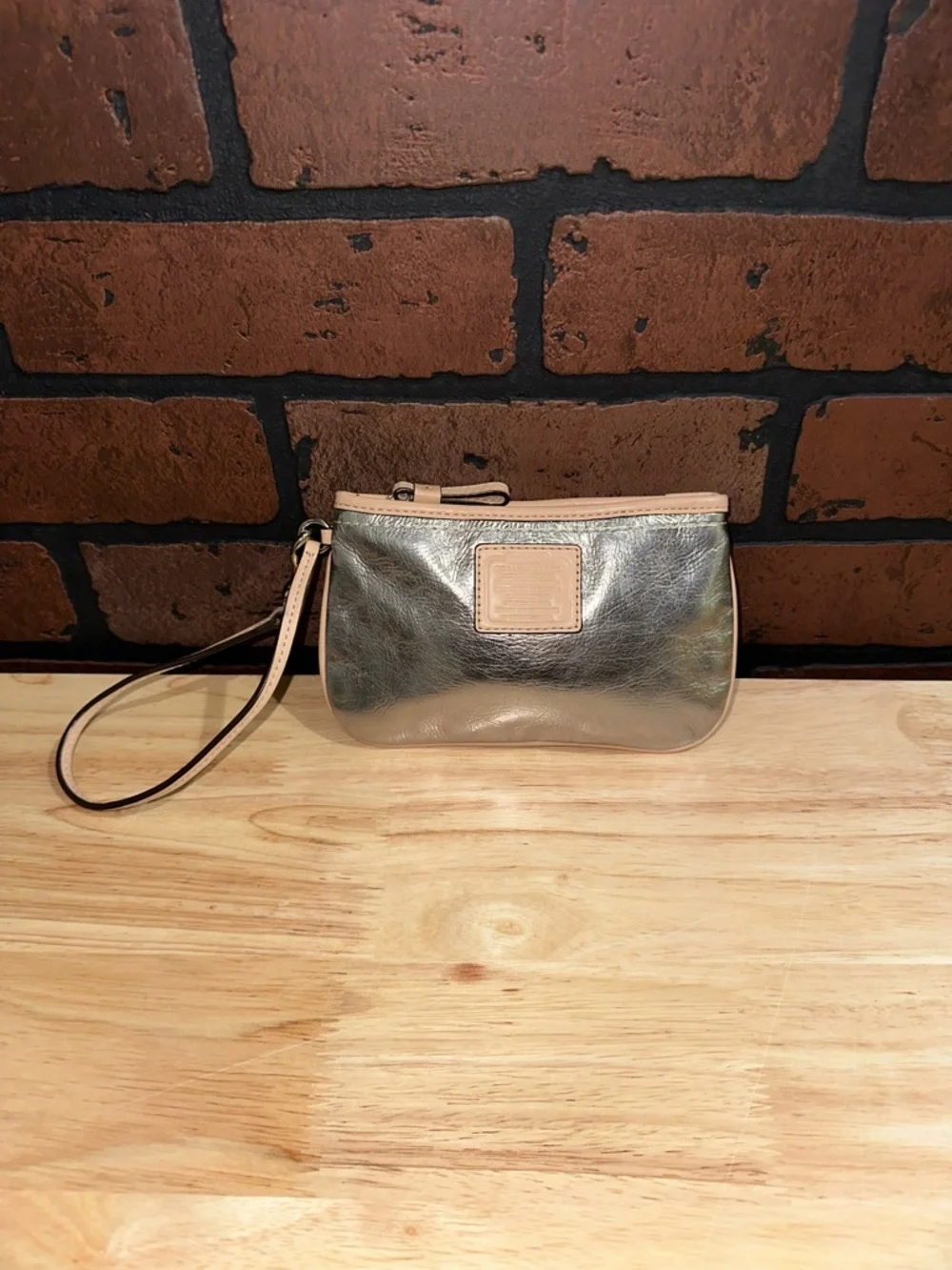 Coach Silver Metallic Wristlet with Nude Trim